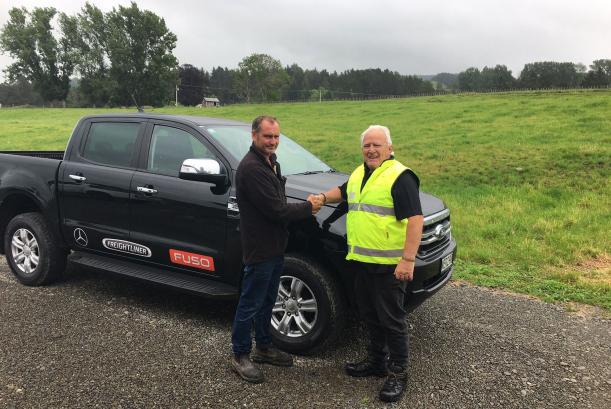 Hamish Cavanagh of HWCT Ltd, who bought a Freightliner Century Class CST112, receives his Ranger from driver trainer Herb Dalton