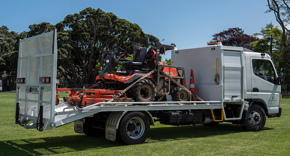 The FUSO Fighter carries a 1.6T reel mower to its destination