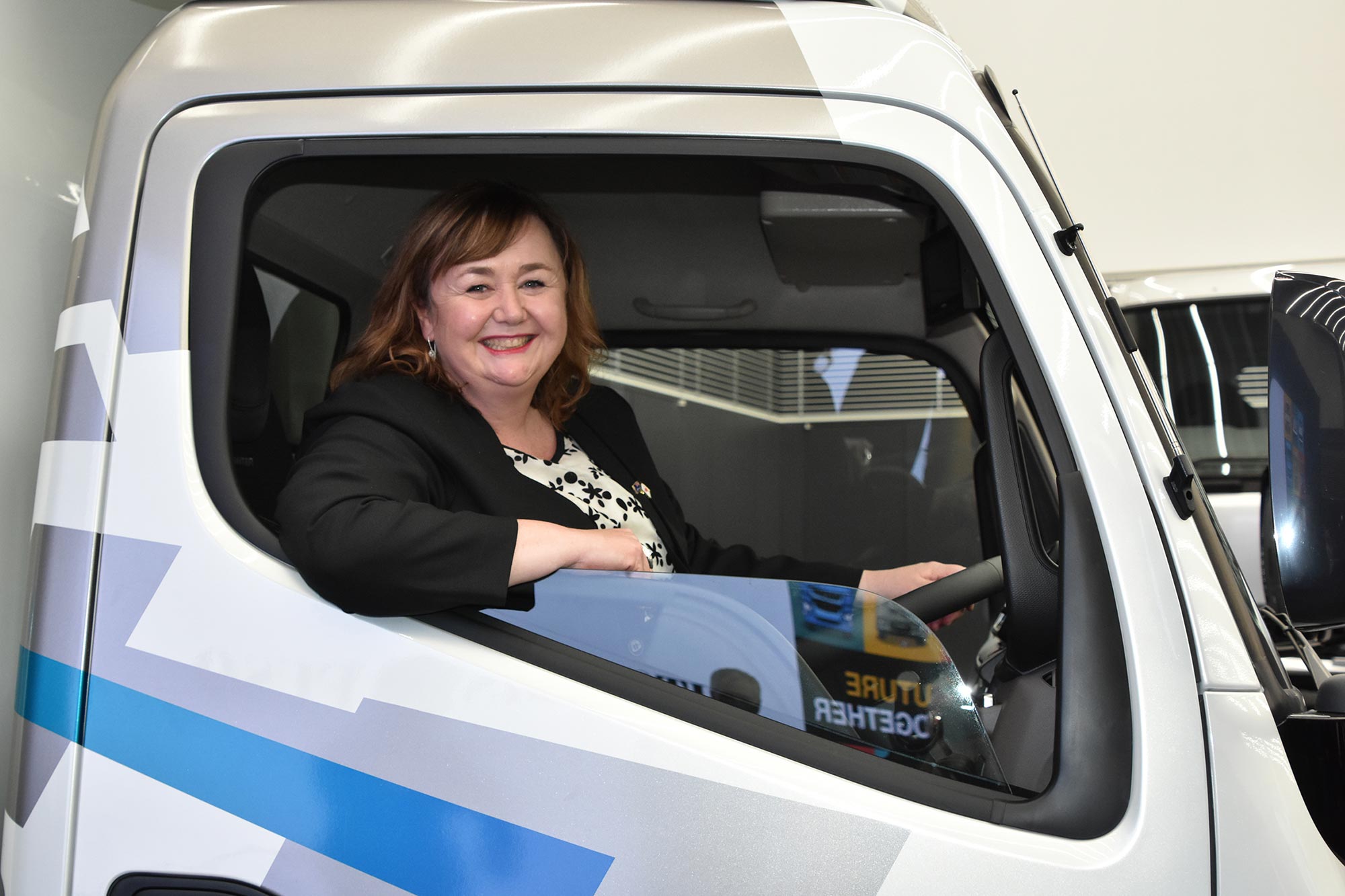 Dr Megan Woods tours home of FUSO electric trucks