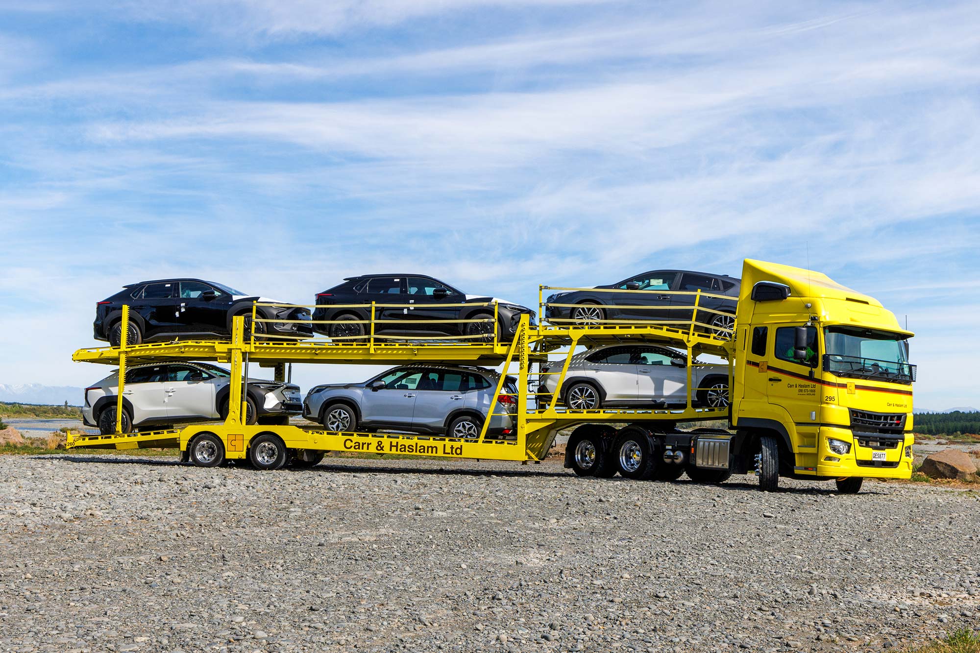 FUSO Shogun 510 with a full load of cars