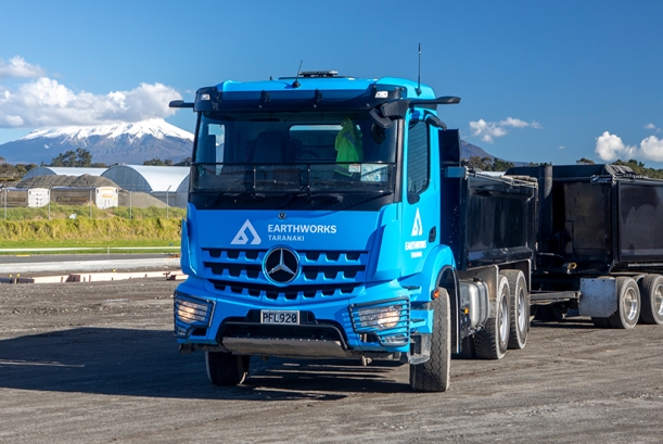 Earthworks Taranaki's Mercedes-Benz Arocs with Mount Taranaki in the background